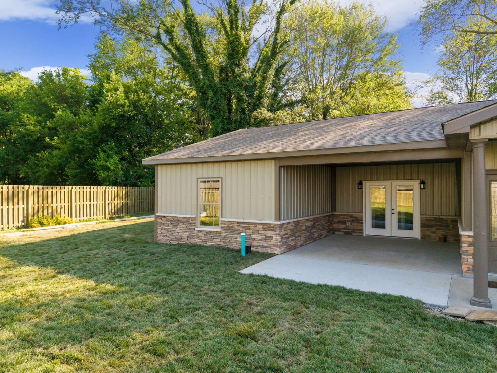 Stone Addition exterior finished in matching stone